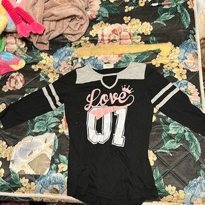 Small women’s t-shirt $15 plus shipping